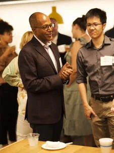 Two guests talking during the 2025 Networking for a Cause reception