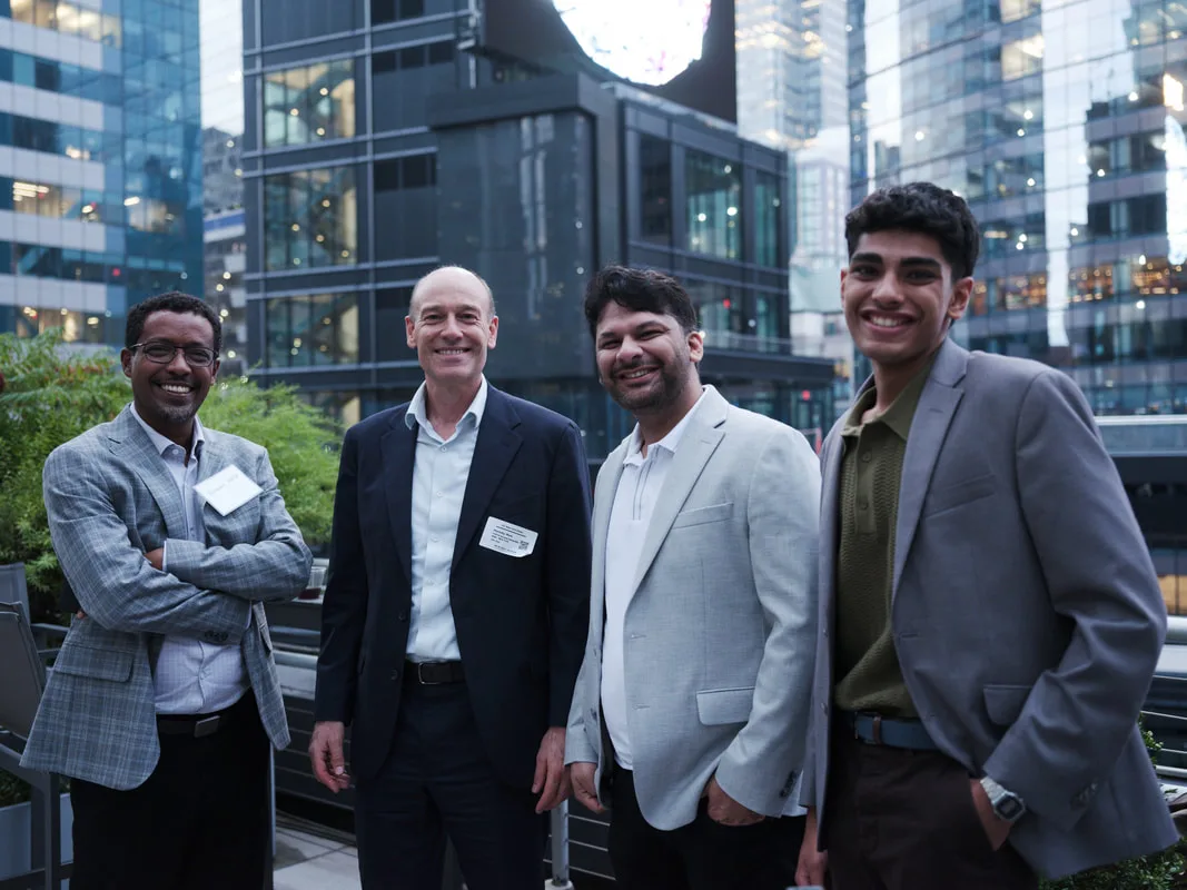 Four guests gathering outdoors during the 2025 Networking for a Cause event