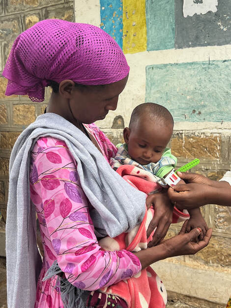 A mother and child participating in an ASDEPO nutrition program in Ethiopia