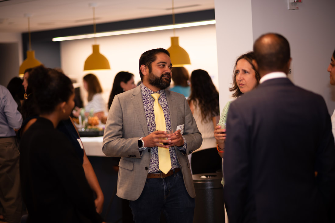Guests building professional connections at the 2024 Networking for a Cause reception